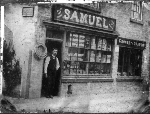 William Samuel standing in the shop entrance William Samuel standing in the shop entrance