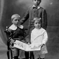 Three of the sons: Cyril (seated), George Ernest junior (at rear) and Alec Marsh (on right)