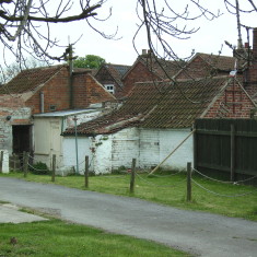 Supra Surviving outbuildings to the rear of the cottages.