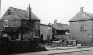 Bagnall_Queen_St_demolished Clearance of the Chip Shop site in the 1960s - the half demolished cottages to the rear and the cow sheds behind No.5 can also be seen. It also shows the Barn before conversion to commercial premises