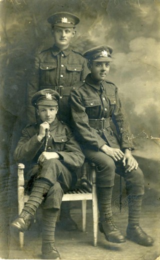 Bob_Sutton243 Pte Bob Sutton (seated right) with two other recruits to the Manchester Regiment. Taken at the JW Hardy Studio, Cleethorpes. Note the new looking footwear. Manchester Archive+
