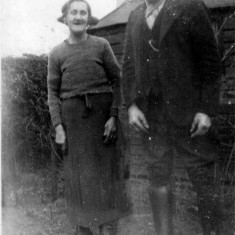 Bolland_0025_Martha_and_Joe__granny_and_grandad_ Martha (granny) and Joe (grandad) in the garden at Retford Cottages