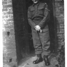 Bolland_0066_Joe__dad_ Joe (dad) wearing Home Guard uniform in the yard at Retford Cottages