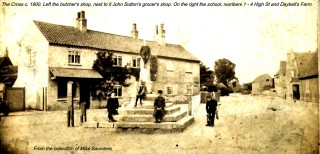 The Cross and Stocks with the butcher's shop and Sutton's shop beyond.