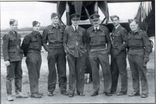 Ch_5_Photo_3 S/Ldr Penny Beauchamp and crew, April 1942. Left to right: Sgt Martin, Sgt Chiasson, Sgt Paul, S/Ldr Beauchamp, P/0 Oliver, Sgt Barnes, Sgt Whiteman. Tom Paul was injured soon afterwards whilst training as a first pilot. | ©️Vincent Holyoak