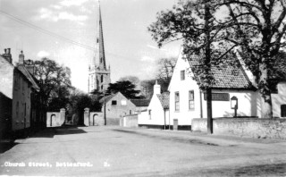Church_St_Copy_of_post_card_MH_6_9_YE_enhanced Church St. c. 1960, showing the Rectory gates and to their left the stables, now demolished. Rutland House (No.4 Church St. in 1901, now No. 3) is on the left.
