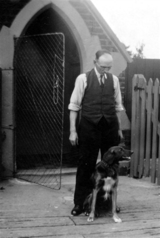 Crossing_keeper___dog_crop1 Mr. Sellers, Crossing Keeper, outside the gatehouse, Bottesford c. 1940