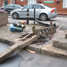 The remains of the stocks were collected and stored in Mr. Taylor's shed
