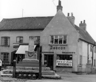 The author recalls that Mr Wood moved to a smaller house, which became a barber's shop. The photograph shows Deacon's hairdressers and tobacconist which occupied these premises for many years from at least 1928 (Kelly's  Directory) until the late 1970's