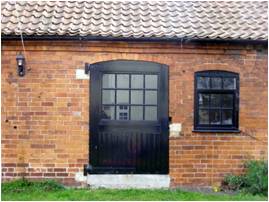Granby_13 Door and window in stable at rear of no.4.