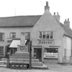 The stocks after they were moved to the east of the cross c. 1960