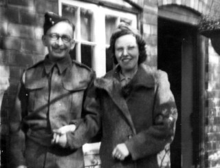 Happy_couple_outside_No_2_A_4_crop Mum and Dad (Frank & Ingrid Sellers) outside their cottage. 2 Church Street, when Dad was on leave, approx. 1940/41.