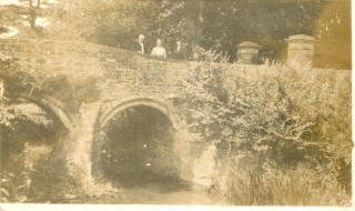 Henry, Mary and Annie Harby on church bridge viewed from the garden of their cottage