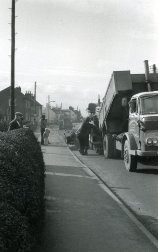 High_St164 Mr Bob Sutton (left foreground) watching progress