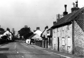 High_St_p.c._AB_right_crop High Street, Misses Adie and Margery Miller's Cake Shop with the Gas Showrooms beyond.