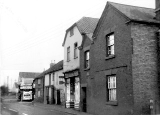 High_St_shops_115_enhanced High Street shops, now demolished.