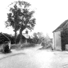 Grantham Road c.1900. The School Master's House can just be seen on the left, beyond the forge. On the right is Daybell's barn.