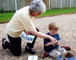 Janet_Kyle___Will_Tobin_0001_crop Janet Kyle shows photographs of the old barn to Will.