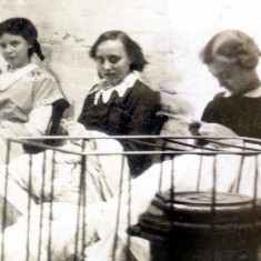 Lace_Room_right_crop_3_girls_by_stove The photograph must have been taken in Summer. The stove would have been very necessary in Winter.