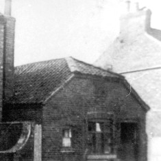 Ladies_outside_house_in_High_St__right_crop_detail 14 What was this building?