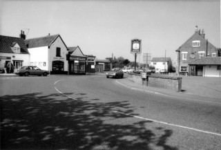 MH_9YC_edited-1 !980s view of the Newsagents; Rainbow Insurance and Nicholls' Garage