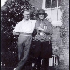 Mary in her Guide uniform with Arthur the gardener at Glebe House, in about 1928/1929. It is known that Arthur also helped in the house but there is no other information about him at present