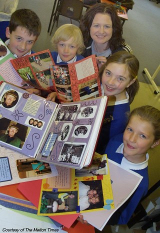 Alison Longdon and some of the students who contributed to the scrapbook.