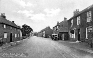 Millership_2_b_w_72_Text 1920/30s view east down High Street towards the Rutland Arms
