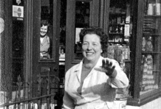 Moulsher_A_Mrs_Moulsher___Jean_Dunsmore_crop Mrs. Moulsher outside the shop