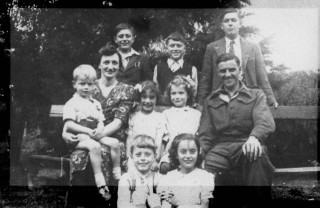 The Norris Family in the 1940s. Back row: Bernard, Ian and Gerald. Middle row: Geoff, Mrs Norris, Carole, Yolande, Mr Norris. Front Row: George and Jennifer