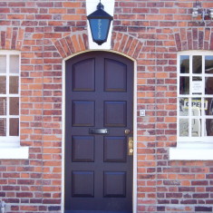 OLYMPUS DIGITAL CAMERA Queen Street - was this door to the Police Station once a brick length wider on each side? Or is this just a detail to 'frame' the entrance'?
