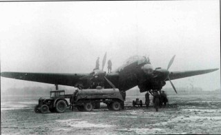 Photo_2_Ch4_714.LR F/Sgt 'Ginger' Hathersich's 'B-Beer', Manchester L7486 is refuelled at an icy West Malling on the morning of the 12th February 1942, having diverted there on return from Mannheim the night before. | ©️Vincent Holyoak