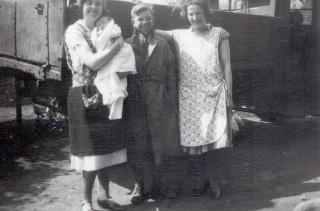 Photos062 Eric Turner between Dot Samuel (holding Keith) and Mary Samuel (Keith's aunts)