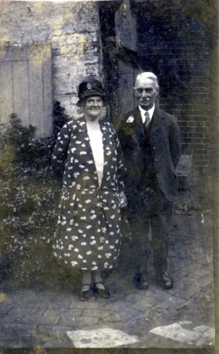 Photos075 Mrs Mary Ellen and Mr William Samuel in later life standing in the yard of the Market Street Store