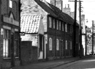 Queen_St_looking_North_coop_72 The old Co-op and Gregg's, newsagent.