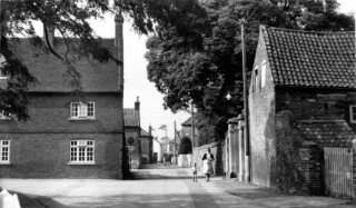Chapel Street from Church Street, the entrance to the stables on the right.