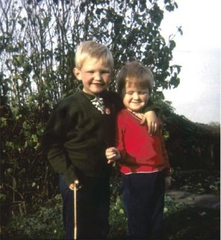 With my brother Robert in the garden at Pinfold Lane, c. 1965.