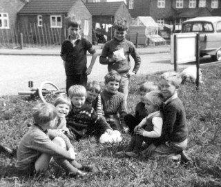 A picture taken in south Crescent near my grandmother's house not long before my cousins emigrated to Australia. Pictured here are; Godfrey Sutton and Neil Coddington (standing), with (sitting), left to right, Robert Bradshaw, Peter Wilson, myself, Sarah, Neil, & Sean Bradshaw, Donna and Chris Taylor.