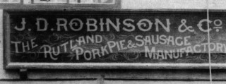 Details of J.D.Robinson's shop sign