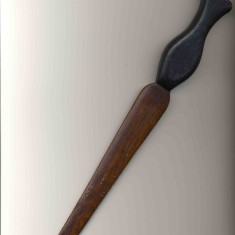 Paper knife made of mahogany from HMS Vanguard. The ship exploded in Scapa Flow on the night of July 9th, 1917 with the loss of 843 men from the crew of 845 who were onboard that night. The knife is inscribed 'HMS Vanguard' with other writing that is no longer legible