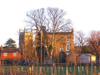 Stathern Rectory and the tower of St Guthlac's