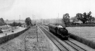 Steam_Ttrain_at_Orston_Crossing_horizontal_crop_enhanced Steam Train at Orston Crossing