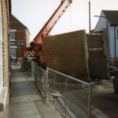 Lifting hydraulic shutters on High Street