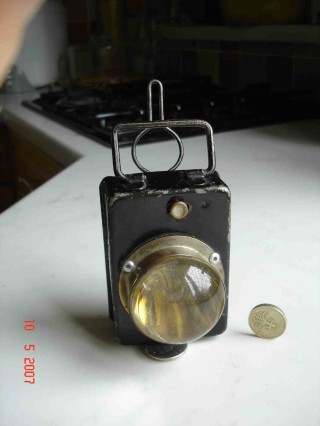 Torch_3 WW1 German Torch - See unusual petal shaped pattern of indentations on reflector.