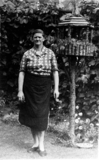 Mrs Vera Bradshaw, in the police station garden at Bottesford, 1950.