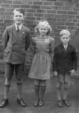 What_it_was_like_Picture1 This photograph was the first of all our family at Bottesford School, with my sister Angela and brother John, taken in 1948.