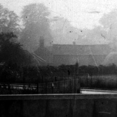 misty_buildings_in_background2 View of Farmhouse before the building of new houses on Rutland Lane and Easthorpe Road