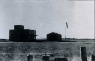 p_127 Quiet and forlorn, Bottesford Flying Control keeps silent watch over the deserted aerodrome. The war is over, the aircraft have departed and Bottesford relegated to use as a storage site