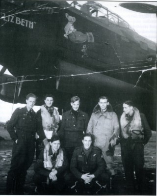 The crew of 'L-Liz'beth', Bottesford, Spring 1943. Standing, left to right: Sgt W.S. Buchanan, Sgt C.A. Chapman, Sgt J. Greenwood, Sgt W. Bruce, Sgt N.C. Smith. Front: Sgt P. Donlevy, Sgt A.E. Michaels