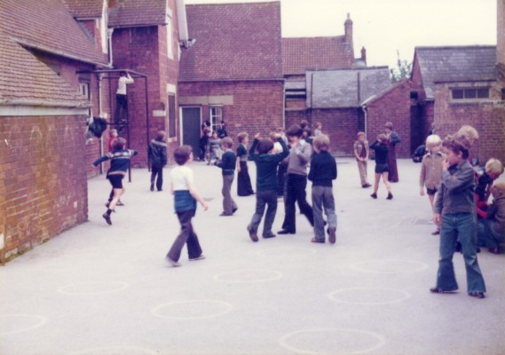 Play time in the yard at the back of the Old School building on Grantham Road, Bottesford: a group of 10-11 year olds taking a break | Collection of Mr Noel Carolan